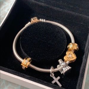 Pandora two toned bracelet 14 k gold w charms